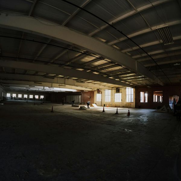 An empty, minimalist training space with soft ambient light.